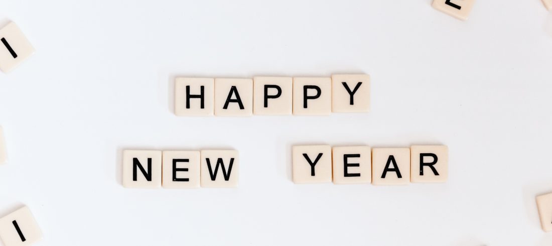 Letter tiles that spell Happy New Year