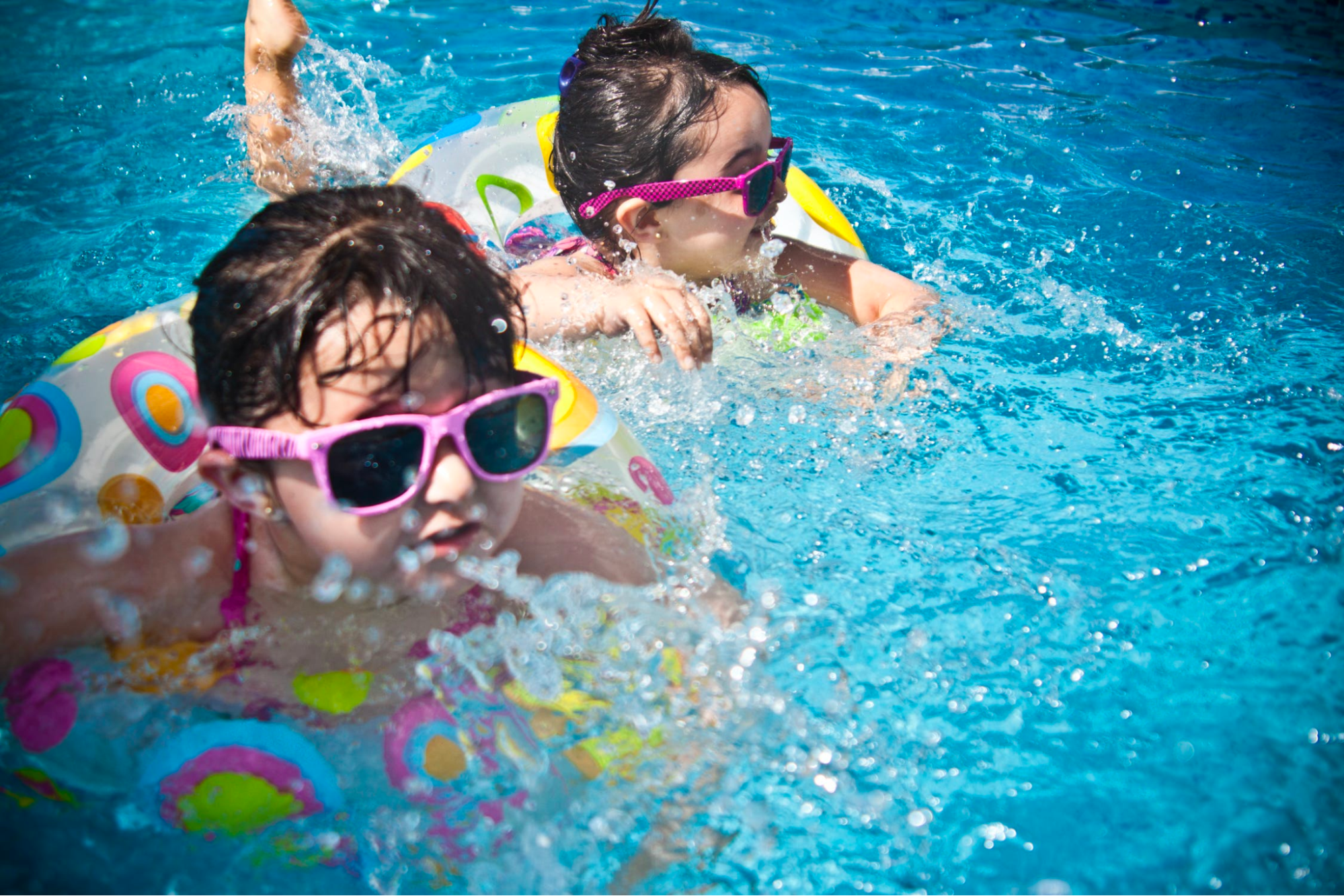 two young children in pool premier medical group hv